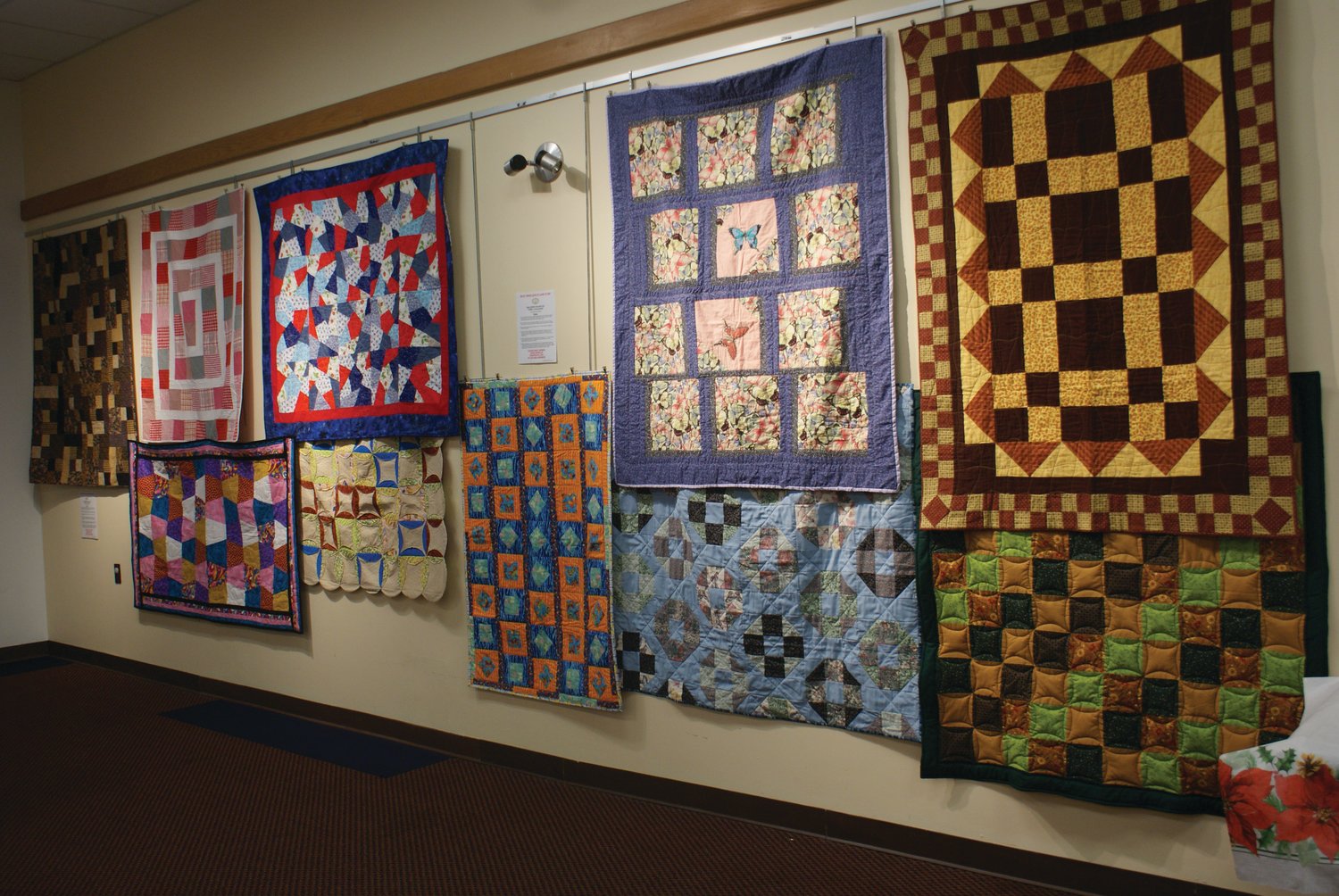 READY TO DONATE: All quilts will be donated to those in need after the Narragansett Bay Quilters’ Association completes its showing at Central Library.
